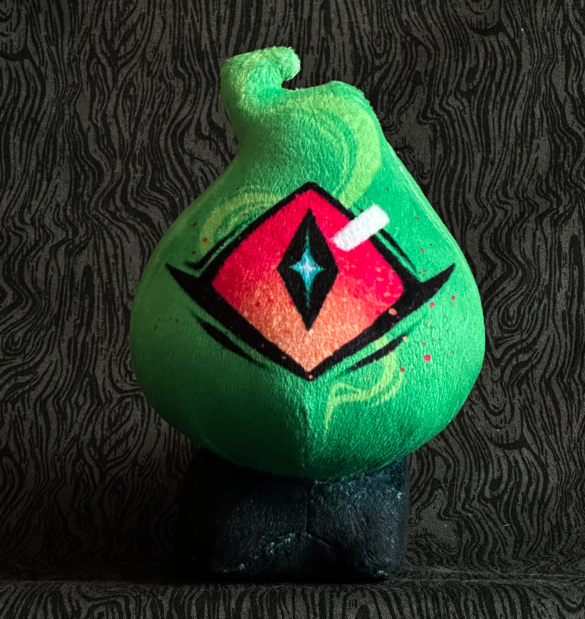 Front view, plush toy "Baby Bambi" acid green flame, pink and orange eye. green-black body.